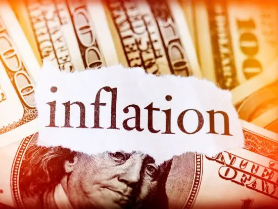 inflation title over one hundred dollar bills