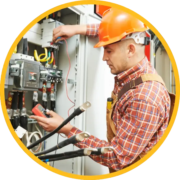 electrician working at electrical panel