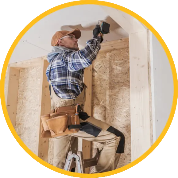 general contractor working on drywall ceiling